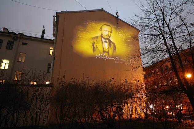 ST PETERSBURG, RUSSIA - NOVEMBER 24, 2020: A projection of Russian writer Fyodor Dosyoevsky s portrait lights up the firewall of a house in Kuznechny Lane where he spent the last years of his life. It is the first mural projection in the historical area of the city. Alexander Demianchuk TASS  TS0EF8DA