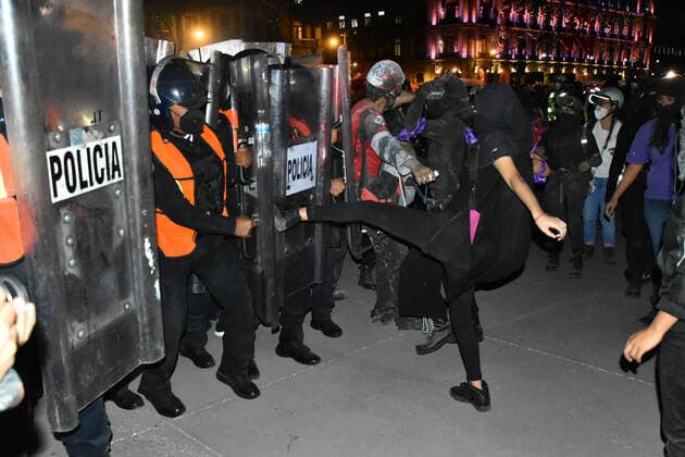 International Day for the Elimination of Violence against Women MEXICO CITY, MEXICO - NOVEMBER 25: A woman confronts a riot police line during the annual march of Day for the Elimination of Violence against Women to demand justice for the violence gender; Mexico is one of the countries with more violence against women, reaching 10 woman killed every day according to the UN. on November 25, 2020 in Mexico City, Mexico **World Rights ** Mexico City Mexico Copyright: RicardoxCastelanxCruz