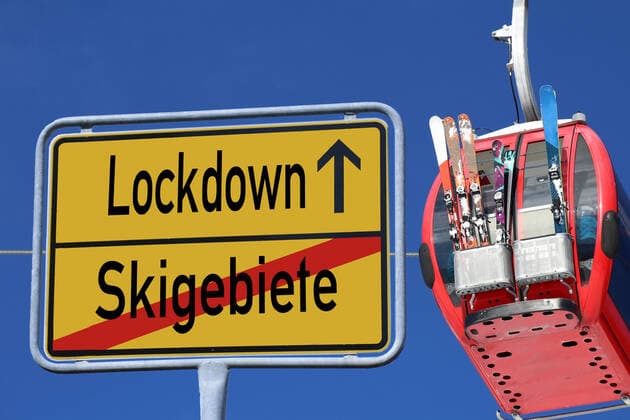 Symbolic picture of closed ski resorts Town exit sign with ski slope in the background Chancellor Merkel wants to keep the ski resorts in Europe closed due to the corona crisis but is meeting with resistance from Austria and Switzerland In the background of the picture is a gondola of the Schönjochbahn in the ski resort Serfaus, Fiss, Ladis Tyrol, Austria Copyright: xx