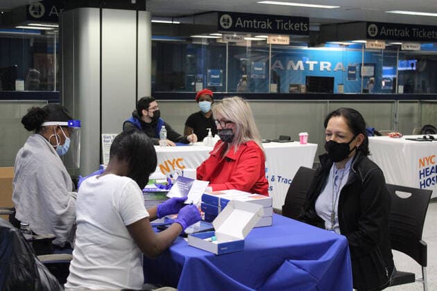November 25, 2020, New York, New York, USA: As a new wave of contagion is announced following Thanksgiving, NYC opened 25 extra Covid-19 testing sites to reduce hours-long lines during holidays. A test checkpoint has been set up at Pennsylvania Station so that people could be tested before traveling and feasting with family. These 2 women are waiting to be self-swab tested. The city s COVID-19 response team supports each person individually. New York just had its highest rate of positive COVID-19 tests since May. New York USA - ZUMAb197 20201125_znp_b197_007 Copyright: xMariexLexBlex