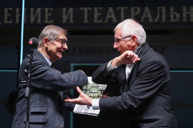 MOSCOW, RUSSIA â€“ NOVEMBER 30, 2020: Actor Igor Yasulovich (L) presents a Stanislavsky prize to theatre critic Vladimir Kolyazin of the GII State Institute of Art Studies for contribution to teaching dramatic art and educating young performers , at the 25th Stanislavsky Award ceremony at the Beethoven Hall of the Bolshoi Theatre. The Stanislavsky Award is an international prize established in 1994 and presented by the Stanislavsky Foundation to theatre actors, directors, critics and others for their contribution to Russian and world theatre. Vyacheslav Prokofyev TASS  TS0F00C8