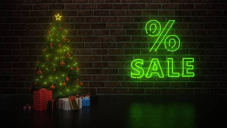 Christmas Sale A christmas tree with green neon sign for the Christmas Sale. 3d illustration.
