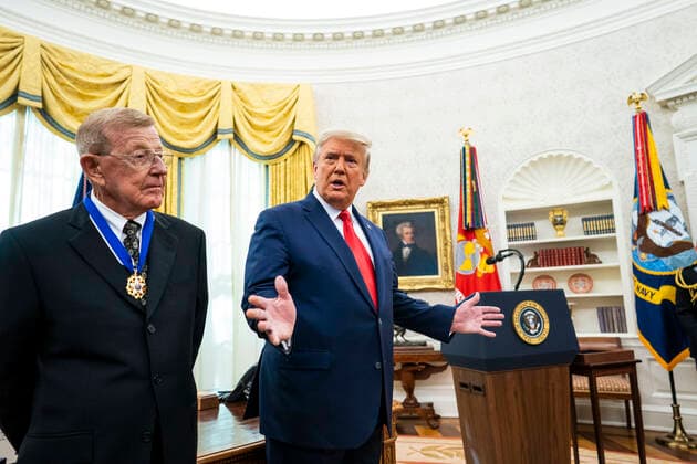 December 3, 2020, Washington, District of Columbia, USA: United States President Donald J. Trump makes remarks to the media about the election and the Attorney General after presenting the Medal of Freedom to Lou Holtz, in the in the Oval Office of the White House in Washington, DC, Thursday, December 3, 2020. Standing at left is Lou Holtz Washington USA - ZUMAs152 20201203_zaa_s152_007 Copyright: xDougxMillsx