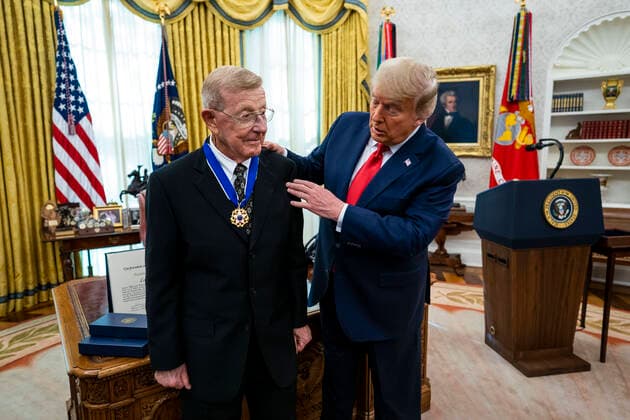 United States President Donald J. Trump presents the Medal of Freedom to Lou Holtz, in the in the Oval Office of the White House in Washington, DC, Thursday, Dec, 3, 2020. Afterwards he makes remark about the election and the Attorney General. Copyright: xDougxMillsx-xPoolxviaxCNPx MediaPunchx