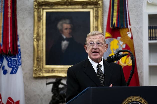 Former college football coach Lou Holtz delivers remarks before President Trump presented him with a Medal of Freedom, in the Oval Office at the White House in Washington, DC on Thursday, December 3, 2020. Holtz, the hall of fame college football coach, had a 34 year coaching career that included winning the 1988 national championship with the University of Notre Dame. Holtz coached six different programs to bowl games and four different teams to top 20 final rankings. Pool photo by Doug Mills  WAX20201203340 DOUGxMILLS
