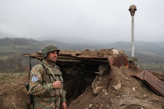 NAGORNO KARABAKH - DECEMBER 5, 2020: A Nagorno Karabakh soldier in the village of Taghavard, Martuni District. On 9 November, the leaders of Armenia, Russia and Azerbaijan signed a ceasefire agreement to end the military conflict in Nagorno-Karabakh and to deploy a Russian peacekeeping force in the region. After the ceasefire agreement was signed, part of the village of Taghavard came under Azerbaijani control. Alexander Ryumin TASS  TS0F09A4