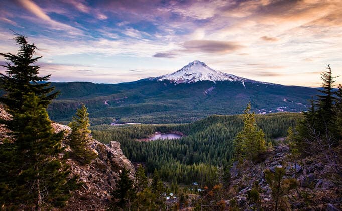 Mt. Hood in Oregon at Sunrise with trees and lake Mount Hood, OR, United States CR_BRDO201202A-583160-01
