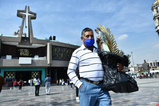 Mexico: Guadalupe Day Celebrations MEXICO CITY, MEXICO - DECEMBER 8: A Faithful holds a sculpture of Virgin of Guadalupe while visit the Basilica of Guadalupe church as part of pilgrimage to celebrates Guadalupe day, who celebrate on December 12 but as attempt to stop the spread of the new covid-19, the religious precinct will remain closed closed from December 10 to avoid crowds during the Guadalupe Day celebrations. On December 8, 2020 in Mexico City, Mexico **World Rights ** Mexico City Mexico Copyright: RicardoxCastelanxCruz