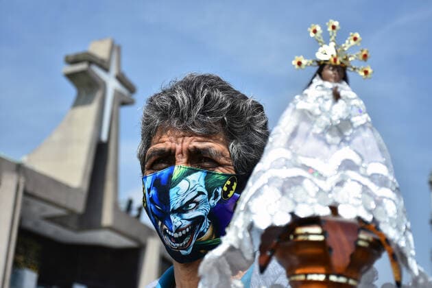 Mexico: Guadalupe Day Celebrations MEXICO CITY, MEXICO - DECEMBER 8: A Faithful holds a sculpture of Virgin of Guadalupe while visit the Basilica of Guadalupe church as part of pilgrimage to celebrates Guadalupe day, who celebrate on December 12 but as attempt to stop the spread of the new covid-19, the religious precinct will remain closed closed from December 10 to avoid crowds during the Guadalupe Day celebrations. On December 8, 2020 in Mexico City, Mexico **World Rights ** Mexico City Mexico Copyright: RicardoxCastelanxCruz