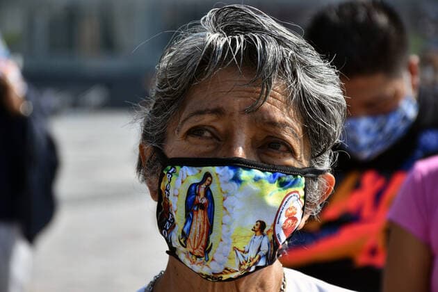 Mexico: Guadalupe Day Celebrations MEXICO CITY, MEXICO - DECEMBER 8: A Faithful wears a protective mask with the stamped picture of Virgin of Guadalupe while visit the Basilica of Guadalupe church as part of pilgrimage to celebrates Guadalupe day, who celebrate on December 12 but as attempt to stop the spread of the new covid-19, the religious precinct will remain closed closed from December 10 to avoid crowds during the Guadalupe Day celebrations. On December 8, 2020 in Mexico City, Mexico **World Rights ** Mexico City Mexico Copyright: RicardoxCastelanxCruz