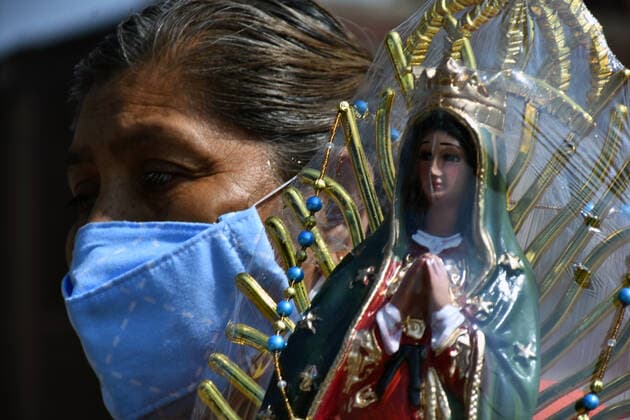 Mexico: Guadalupe Day Celebrations MEXICO CITY, MEXICO - DECEMBER 8: A Faithful holds a sculpture of Virgin of Guadalupe while visit the Basilica of Guadalupe church as part of pilgrimage to celebrates Guadalupe day, who celebrate on December 12 but as attempt to stop the spread of the new covid-19, the religious precinct will remain closed closed from December 10 to avoid crowds during the Guadalupe Day celebrations. On December 8, 2020 in Mexico City, Mexico **World Rights ** Mexico City Mexico Copyright: RicardoxCastelanxCruz