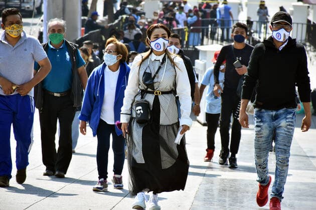 Mexico: Guadalupe Day Celebrations MEXICO CITY, MEXICO - DECEMBER 8: A Faithful wears a protective mask with the stamped picture of Virgin of Guadalupe while visit the Basilica of Guadalupe church as part of pilgrimage to celebrates Guadalupe day, who celebrate on December 12 but as attempt to stop the spread of the new covid-19, the religious precinct will remain closed closed from December 10 to avoid crowds during the Guadalupe Day celebrations. On December 8, 2020 in Mexico City, Mexico **World Rights ** Mexico City Mexico Copyright: RicardoxCastelanxCruz