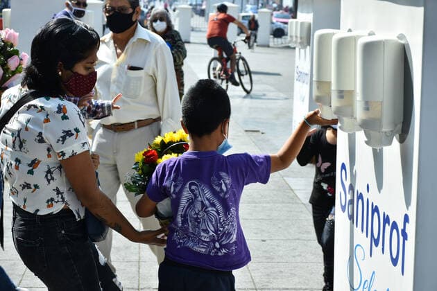 Mexico: Guadalupe Day Celebrations A Faithful takes antibacterial gel as safety measure before enter at the Basilica of Guadalupe church as part of pilgrimage to celebrates Guadalupe day, who celebrate on December 12 but as attempt to stop the spread of the new covid-19, the religious precinct will remain closed closed from December 10 to avoid crowds during the Guadalupe Day celebrations. **World Rights ** Mexico City Mexico Copyright: RicardoxCastelanxCruz