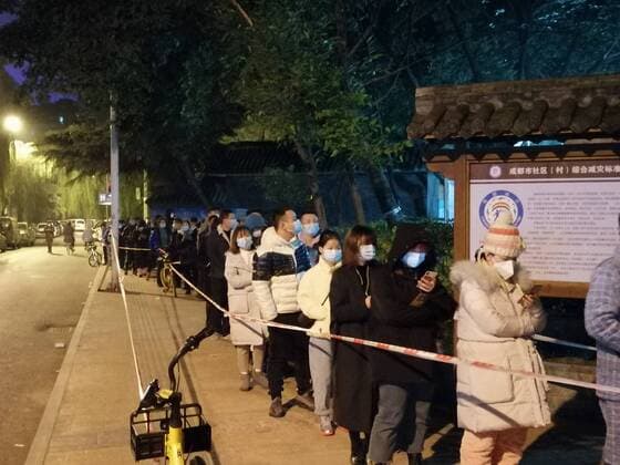CHENGDU, CHINA - DECEMBER 08: People queue up for nucleic acid testing at a temporary COVID-19 testing centre on December 8, 2020 in Chengdu, Sichuan Province of China.  Copyright: xVCGx CFP111309870132