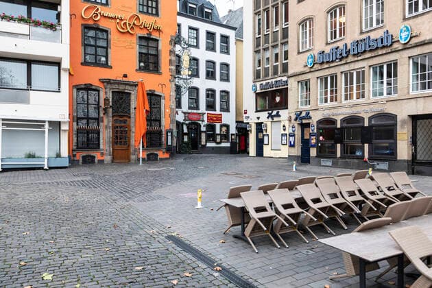 Closed gastronomy at Heumarkt in Cologne, few passers-by during the lockdown due to the coronavirus pandemic