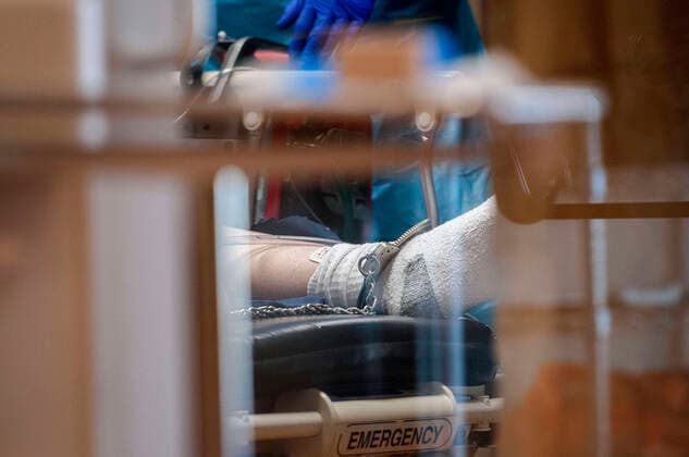 December 11, 2020, USA: An inmate with COVID-19 lies on a hospital bead at Guadalupe County Hospital in Santa Rosa, Friday December 11, 2020. The patient is an inmate at Guadalupe County Corrections and was brought in Thursday. They said he should have been transferred to Albuquerque then but they couldn t get a medical helicopter because of weather. A ambulance arrived later from Albuquerque to transport the man to Lovelace Medical Center. USA - ZUMAab1_ 20201211_zaf_ab1_020 Copyright: xEddiexMoorex