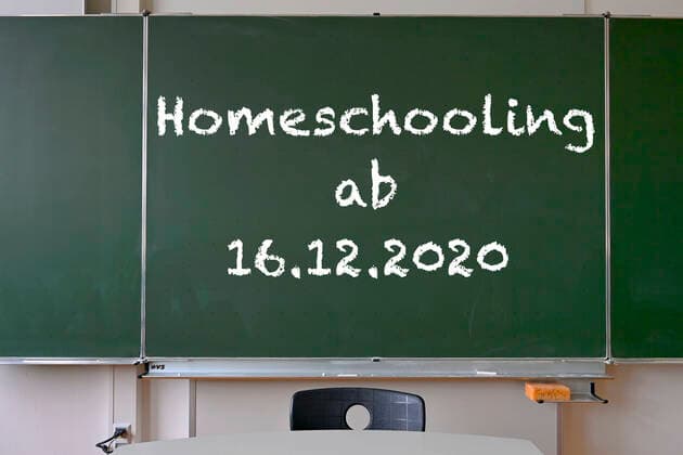 Board with inscription HOMESCHOOLING, hard lockdown, shutdown from 16 12 2020 in Germany, classroom, corona crisis, Germany Board hard lockdown corona