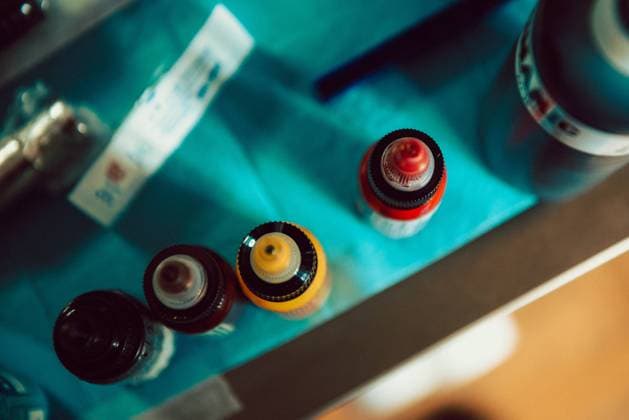 Bottles with colorful tattoo ink Copyright: xAlbertoxMenendezx Model Released