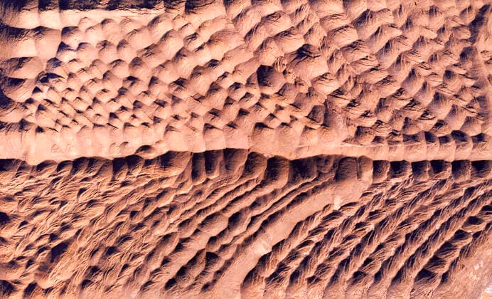 IMAGO Nature: Unsere Erde, Ressourcen, Erze TAICANG, CHINA - DECEMBER 09: Aerial view of imported iron ore at a storage yard of Taicang Port on December 9, 2020 in Taicang, Jiangsu Province of China.  Copyright: xVCGx CFP111310647459