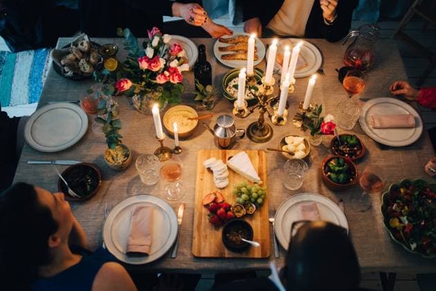 High angle view of friends enjoying food at dinner party , model released, property released Copyright: xMaskotx , MA65102