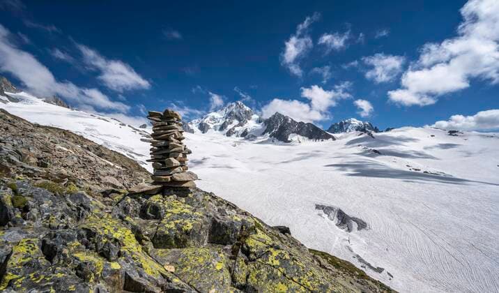 Cairns on the hiking trail, Glacier du Tour, Glacier and mountain peaks, High alpine landscape, left Aiguille du Chardonnet, Chamonix, Haute Savoie, France, Europe Copyright: imageBROKER/MoritzxWolf ibxmmw05900760.jpg