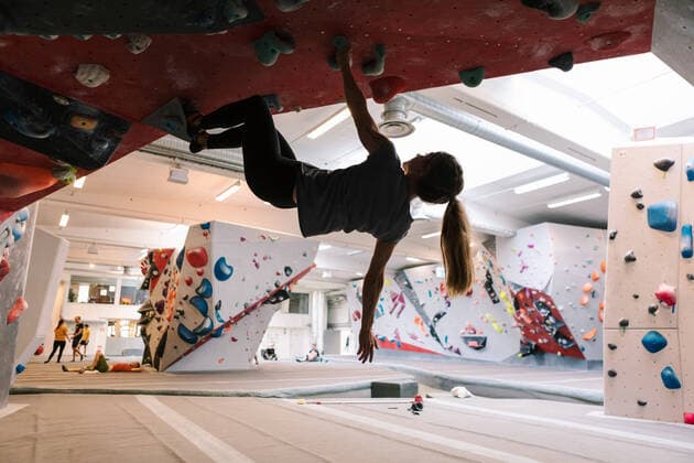 Woman practicing wall climbing in gym , model released, property released Copyright: xKentarooxTrymanx , MA78073