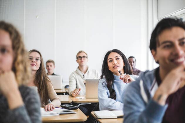 Multi-ethnic male and female students sitting at desk in classroom Sweden, Stockholm, model released, property released Copyright: xMaskotx , MA79943