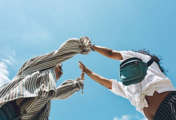 IMAGO Creative: Gesellschaft, Integration Group of friends embraced and putting their hands together. All of them very happy and showing happiness, Model released Copyright: xLuisxMarioxHernandezx MR