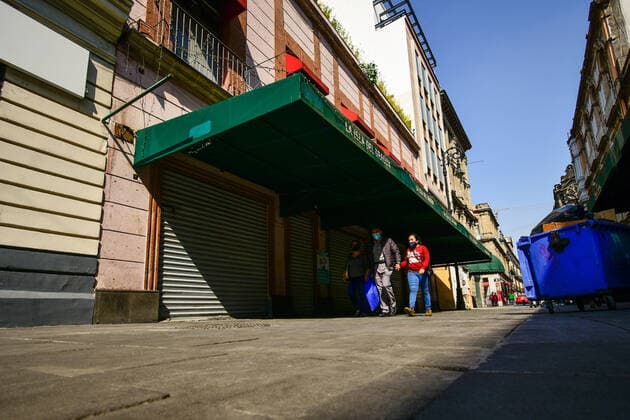 December 19, 2020, Mexico, Mexico: People wearing face masks walk along Motolinia street in Mexico City..Claudia Sheinbaum, the mayor of Mexico City announced that the metropolitan area that includes Mexico City and the State of Mexico turned red at the epidemiological traffic light due to the increase in hospitalizations and occupancy of 78% of the hospital beds available to treat the coronavirus. The red light indicates that all non-essential activities will be restricted from December 13 to January 10. Mexico Mexico - ZUMAs197 20201219_zaa_s197_143 Copyright: xGuillermoxDiazx