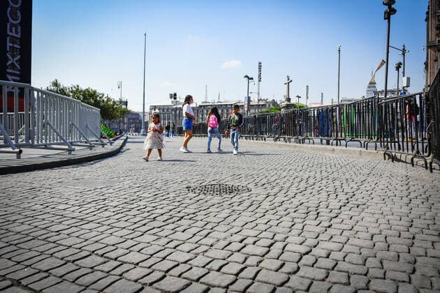 December 19, 2020, Mexico, Mexico: Kids walk on a semi deserted Moneda Street in Mexico City..Claudia Sheinbaum, the mayor of Mexico City announced that the metropolitan area that includes Mexico City and the State of Mexico turned red at the epidemiological traffic light due to the increase in hospitalizations and occupancy of 78% of the hospital beds available to treat the coronavirus. The red light indicates that all non-essential activities will be restricted from December 13 to January 10. Mexico Mexico - ZUMAs197 20201219_zaa_s197_154 Copyright: xGuillermoxDiazx