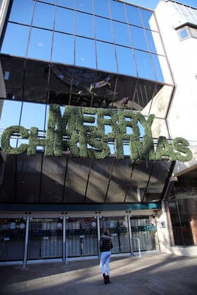 Merry Christmas above the entrance to Queensgate shopping centre, which is closed except essential shops, Peterborough city centre today, (Sunday Dec 20), after it was announced by Prime Minister Boris Johnson that Peterborough, along with London and the South East, will be placed into the new highest level of Coronavirus restrictions, Tier 4 - Very High. It was placed in Tier 3 for only 24 hours before this new move by the Government. 