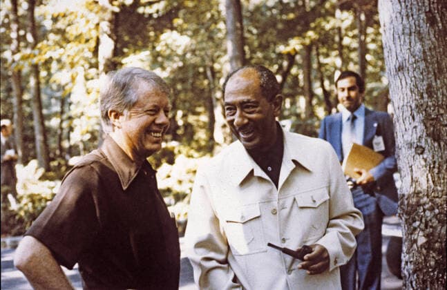 Sep 6, 1978 - Thurmont, Maryland, United States of America - United States President JIMMY CARTER, left, and President ANWAR SADAT of Egypt, right, appear relaxed as they prepare for the summit talks with Prime Minister of Israel at Camp David. Thurmont United States of America - ZUMAz03_ 19780906_jes_z03_199 Copyright: xWhitexHousex