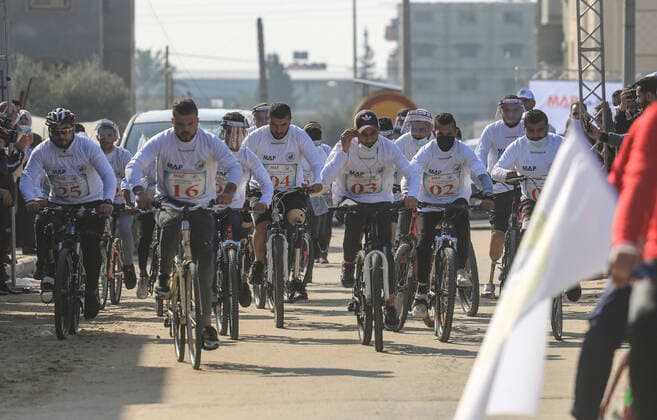 December 21, 2020, Central The Gaza Strip, The Gaza Strip, Palestine: Palestinian athlete with disabilities or amputee take part in a bicycle race in the central of the Gaza Strip. Central The Gaza Strip Palestine - ZUMAq100 20201221_zaa_q100_029 Copyright: xMahmoudxKhattabx