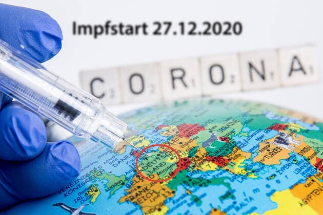 Bamberg, Germany 21 December 2020 A hand in rubber gloves holds a vaccination syringe, the needle of the vaccination syringe points on the globe to Germany On the globe is the lettering Corona In the background it says, vaccination start 27 12 2020 Bavaria Copyright: xFotostandx xK.xSchmittx