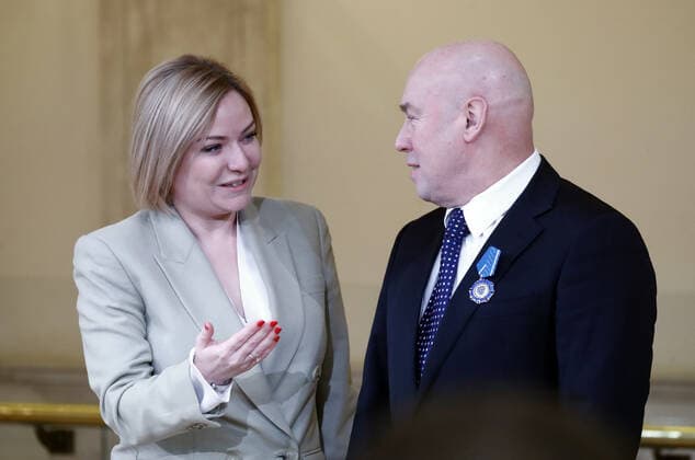 MOSCOW, RUSSIA - DECEMBER 24, 2020: Russia s Culture Minister Olga Lyubimova (L) and actor Viktor Sukhorukov awarded an Order of Honor during a ceremony at the Beethoven Concert Hall of the Bolshoi Theater. Artyom Geodakyan TASS  TS0F2B3D