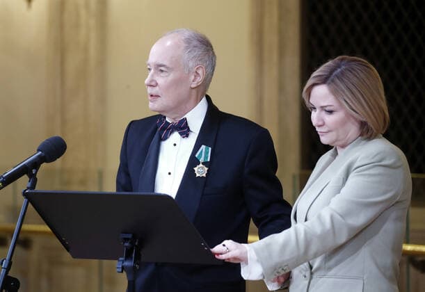 MOSCOW, RUSSIA - DECEMBER 24, 2020: Russia s Culture Minister Olga Lyubimova (R) and actor Vladimir Konkin awarded an Order of Friendship during a ceremony at the Beethoven Concert Hall of the Bolshoi Theater. Artyom Geodakyan TASS  TS0F2B42