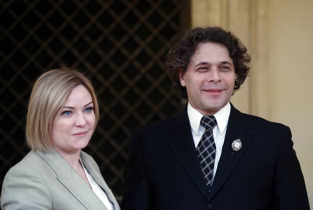 MOSCOW, RUSSIA - DECEMBER 24, 2020: Russia s Culture Minister Olga Lyubimova (L) and Russian National Orchestra flute band accompanist Maxim Rubtsov awarded an Order for Merit to the Fatherland 2nd class during a ceremony at the Beethoven Concert Hall of the Bolshoi Theater. Artyom Geodakyan TASS  TS0F2B5C