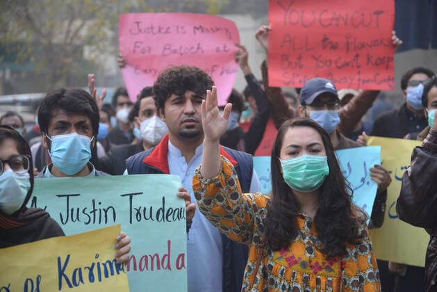 Pakistan: Protest against social activists Activists of Civil Society hold placards during protest against social activists women Karima Baloch killed in Canada outside press club Lahore on December 24, 2020.A dissident Pakistani human rights activist living in exile in Canada has been found dead in Toronto after going missing.Karima Baloch, 37, was granted asylum in Canada in 2016 after her work as a human rights activist in the troubled Pakistan state of Balochistan had led to her being followed and threatened by the authorities.The first chair of the Baloch Students Organization (BSO-Azad), a political student organisation, she had been advocating for the rights of those in a region home to a long-running insurgency movement, and raising Copyright: RanaxSajidxHussain