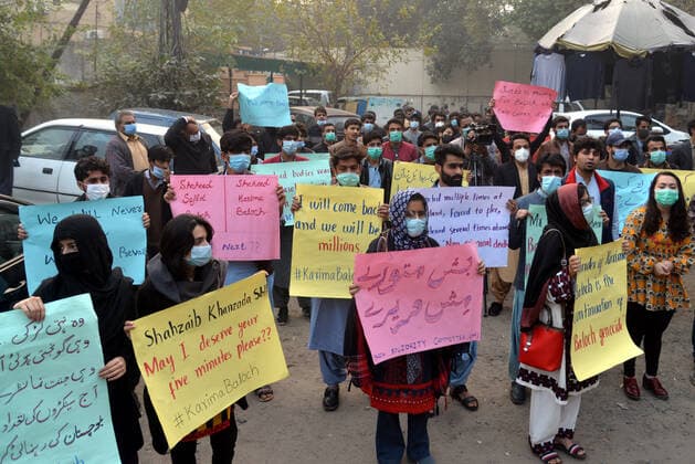 Pakistan: Protest against social activists Activists of Civil Society hold placards during protest against social activists women Karima Baloch killed in Canada outside press club Lahore on December 24, 2020.A dissident Pakistani human rights activist living in exile in Canada has been found dead in Toronto after going missing.Karima Baloch, 37, was granted asylum in Canada in 2016 after her work as a human rights activist in the troubled Pakistan state of Balochistan had led to her being followed and threatened by the authorities.The first chair of the Baloch Students Organization (BSO-Azad), a political student organisation, she had been advocating for the rights of those in a region home to a long-running insurgency movement, and raising Copyright: RanaxSajidxHussain