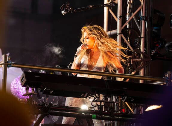 2021 New Year celebration on Times Square Jennifer Lopez performs on stage during 2021 New Year celebration on Times Square. Because of COVID-19 pandemic no revelers were allowed to be on Times Square, only few essential workers received special invitations and were seated inside socially distanced pods. New York New York United States Copyright: LevxRadin