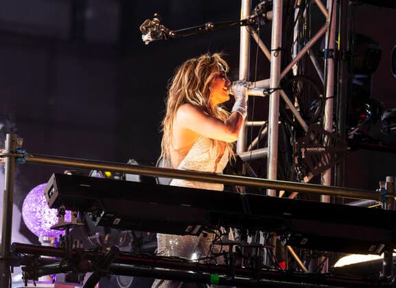 2021 New Year celebration on Times Square Jennifer Lopez performs on stage during 2021 New Year celebration on Times Square. Because of COVID-19 pandemic no revelers were allowed to be on Times Square, only few essential workers received special invitations and were seated inside socially distanced pods. New York New York United States Copyright: LevxRadin