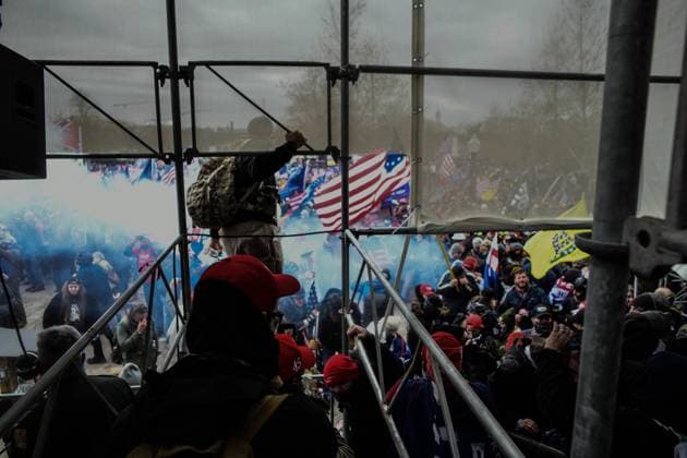 January 6, 2021, Washington, District of Columbia, USA: Pro-Trump mobs storm the US Capitol Wednesday, marauding in hallways, offices and forcing their way into Senate chambers in a stunning attempt to stop the official counting of electoral votes confirming the presidential election the Joe Biden. Washington USA  - ZUMA 20210106_mda_l113_220 Copyright: xMiguelxJuarezxLugox