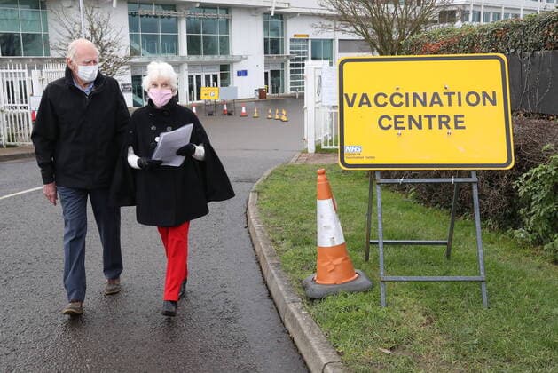 . 11 01 2021. Epsom, United Kingdom. The Covid 19 vaccination hub at the Epsom Racecourse in Surrey, as mass vaccinations start across the UK today .  xStephenxLockx xi-Imagesx IIM-21977-0048