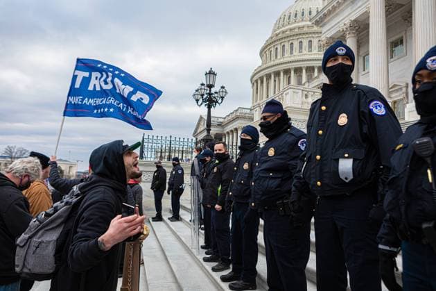 The US Capitol Breached by Pro-Trump Rioters Pro-Trump supporters and far-right forces flood DC to protest president s election loss, hundreds breach the Capitol Building. Washington DC District of Columbia United States Copyright: MichaelxNigro