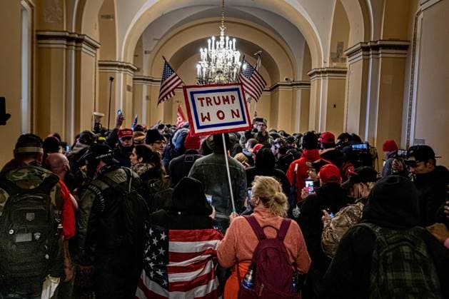 The US Capitol Breached by Pro-Trump Rioters Pro-Trump supporters and far-right forces flood DC to protest president s election loss, hundreds breach the Capitol Building. Washington DC District of Columbia United States Copyright: MichaelxNigro