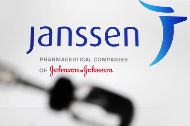 January 13, 2021, Ukraine: In this photo illustration, the Janssen logo (Janssen Pharmaceutical Companies of Johnson & Johnson) is seen in front of a vial and a medical syringe. Ukraine - ZUMAs197 20210113_zaa_s197_003 Copyright: xPavloxGoncharx