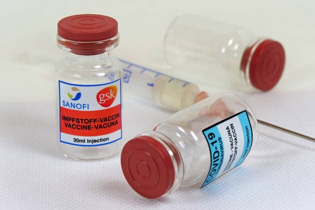 Symbol image Coronaserum vaccine can with syringe Corona vaccine
