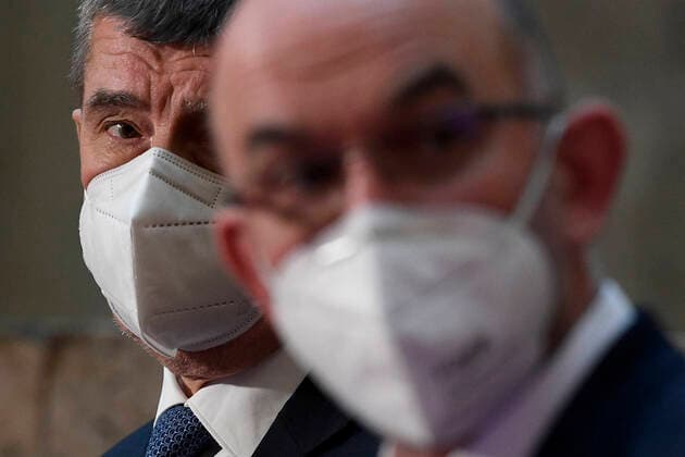 Czech Prime Minister Andrej Babis, left, and Health Minister Jan Blatny, right, attend a press conference to unveil central reservation system for vaccination, on January 14, 2021, in Prague, Czech Republic. (CTKxPhoto OndrejxDeml) CTKPhotoP202101140435301  dml
