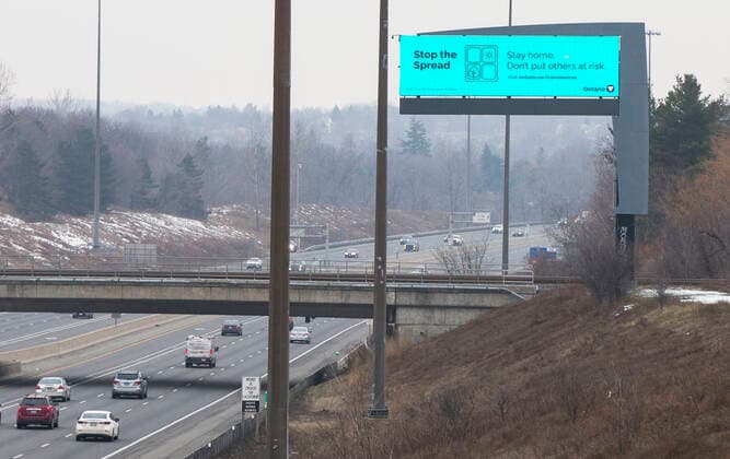 (210114) -- TORONTO, Jan. 14, 2021 -- A screen with a message of Ontario s stay-at-home order is seen on the side of Highway 403 in Missisauga, Ontario, Canada, on Jan. 14, 2021. Ontario s stay-at-home order went into effect on Thursday, requiring residents to stay home except for essential outings. (Photo by Xinhua) CANADA-ONTARIO-COVID-19-STAY-AT-HOME ORDER ZouxZheng 