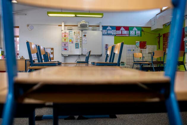 School in the Corona time In an empty classroom of a primary school the chairs are put on the benches The scho Copyright: xInderlied Kirchner-Mediax